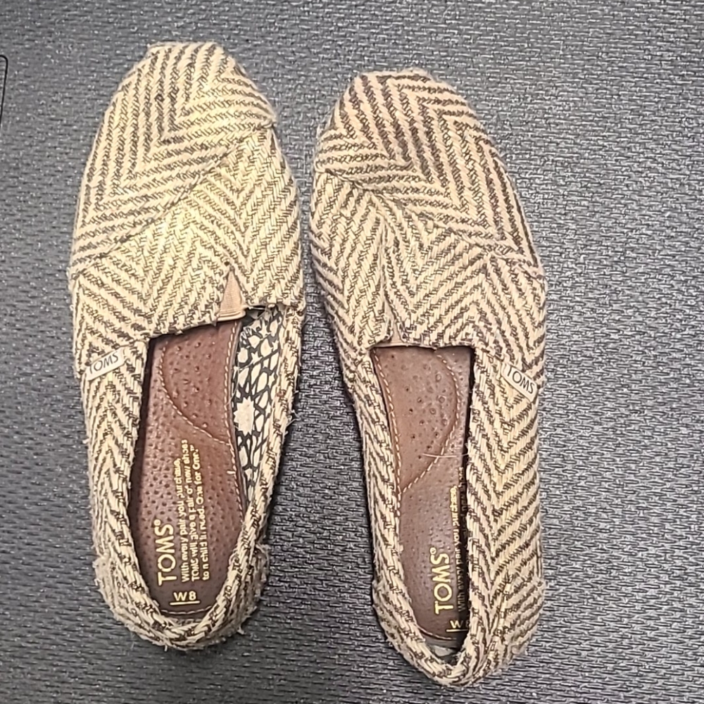 Tom's gold shoes
